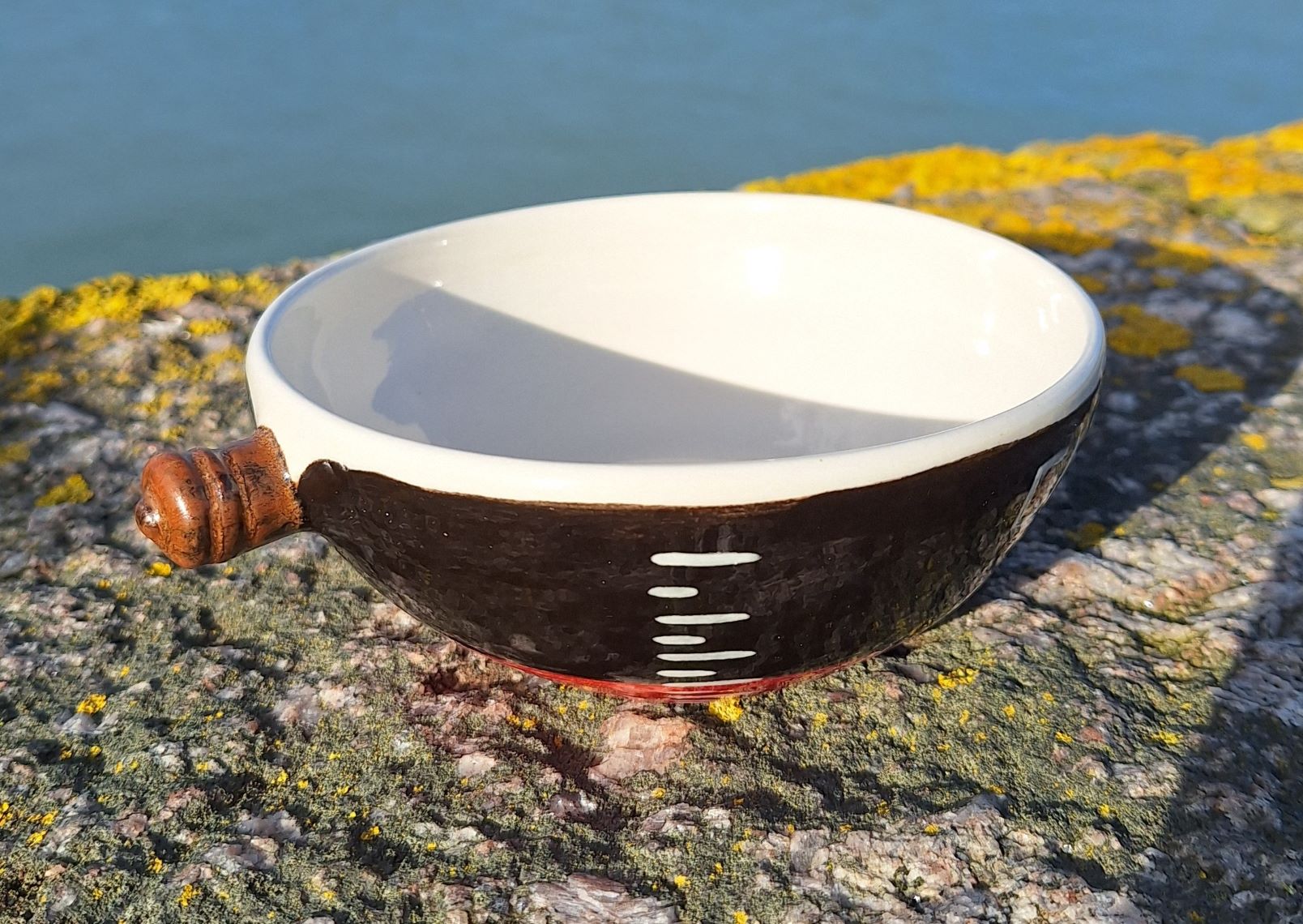 Bol de Cherbourg - noir et rouge - bitte d'amarrage en canon